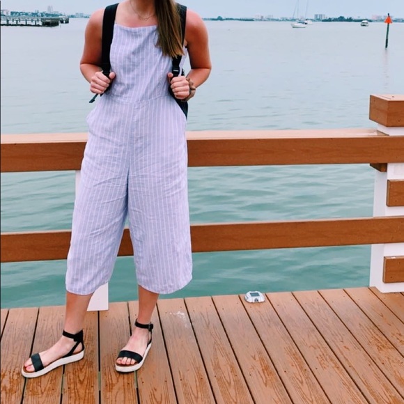 purple and white jumpsuit